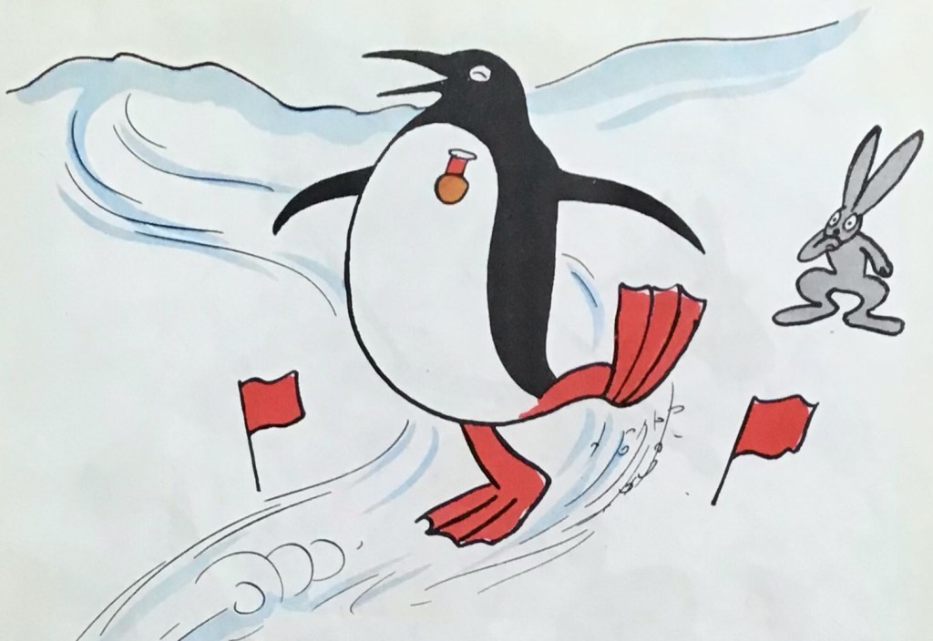 Herr Pingvin kom svepande i svängarna mellan de röda flaggorna! Vilken överdängare! ©Almqvist